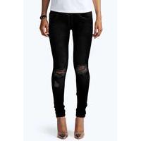 ripped knee black skinny jeans black