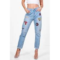 Ripped Boyfriend Jeans With Badges - blue