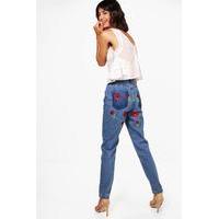 rose embroidered back mom jeans mid blue