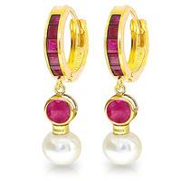 ruby and pearl huggie earrings 465ctw in 9ct gold