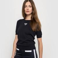 short sleeved jumper with racquet embroidery