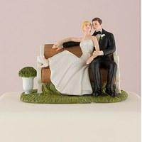 sitting pretty on a park bench couple figurine