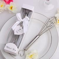 silver kitchen whisk in gift box with a tag