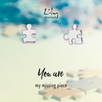 silver jigsaw stud earrings with missing piece message