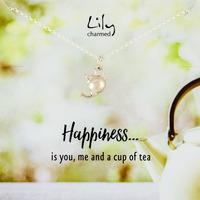silver teapot necklace with happiness message