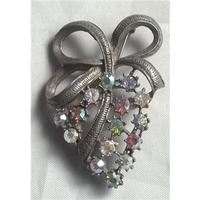 Silver Coloured Brooch With Pink And Green Stones