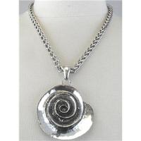 silver tone round fossil pendant necklace