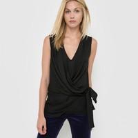 sleeveless blouse with draped v neckline