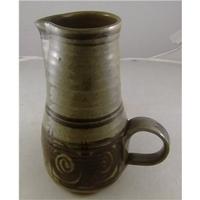 Stoneware tall brown Jug