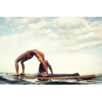 sup yoga class at medano beach