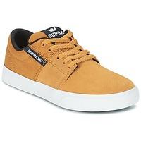 supra kids stacks ii vulc boyss childrens shoes trainers in yellow