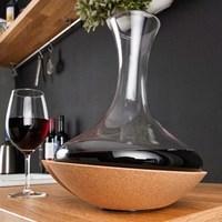 swirling wine carafe