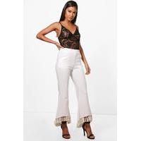 tassle hem flared trousers ivory