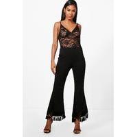 tassle hem flared trousers black