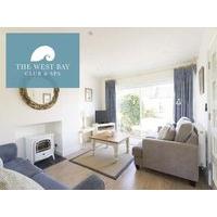 Three bedroom house with bunks at The West Bay Club & Spa