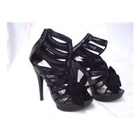 timeless size 5 black high heeled boots