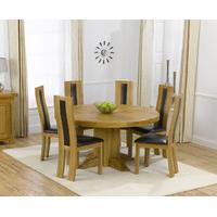 torres 150cm solid oak round pedestal dining table with trento chairs