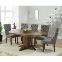 torino dark solid oak extending pedestal dining table with anais fabri ...