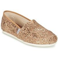 toms seasonal classic womens slip ons shoes in gold