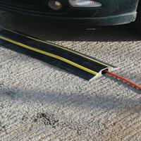 Traffic calming cable protector, 1.5m long, wide hole