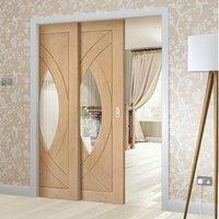 Twin Telescopic Pocket Treviso Oak Veneer Door - Clear Glass