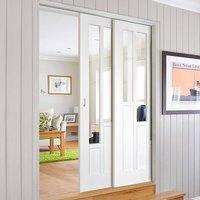 Twin Telescopic Pocket Coventry Style White Primed Doors - Clear Glass