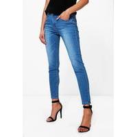 Two Button Mid Rise Skinny Jeans - mid blue