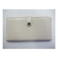 unbranded beige purse