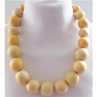 unbranded beige necklace