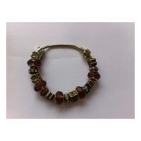 unbranded pandora style gold tone bracelet