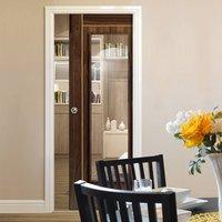 valcor walnut single pocket door clear glass prefinished