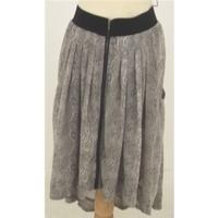 very size 12 brown patterned skirt