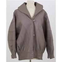 Vintage 1980\'s, size M, light brown batwing leather jacket
