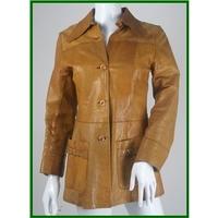 vintage size s brown leather jacket