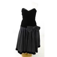 Vintage 1980s After Six by Ronald Joyce London Size 12 Strapless Black Velvet Drop Hem Dress with Large Diamante Bow