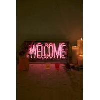 welcome neon sign light pink