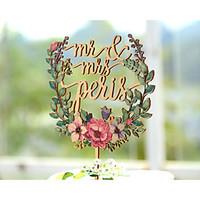 wedding cake topper printed with floral wreath and personalized with l ...