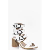 western buckle block heels white