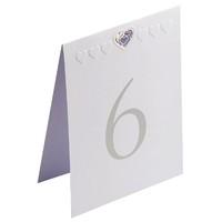 white and silver heart table numbers