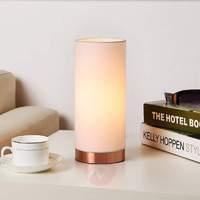 white table lamp ronja with a copper coloured base