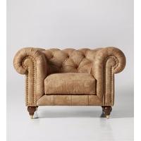 winston armchair in tan leather dark feet