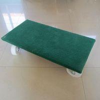 wooden dolly with carpet covered platform