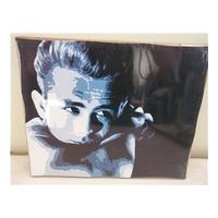 Wood mounted photograph of James Dean.