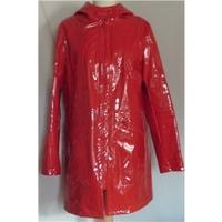 zara women size medium orange waterproof coat