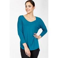 zip back dolphin hem top